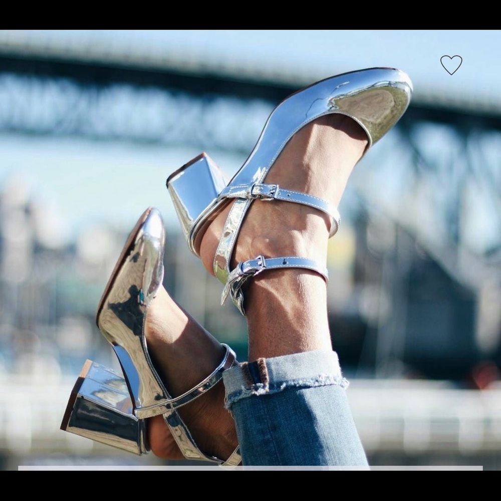 Never worn! Silver metallic Aldo heels